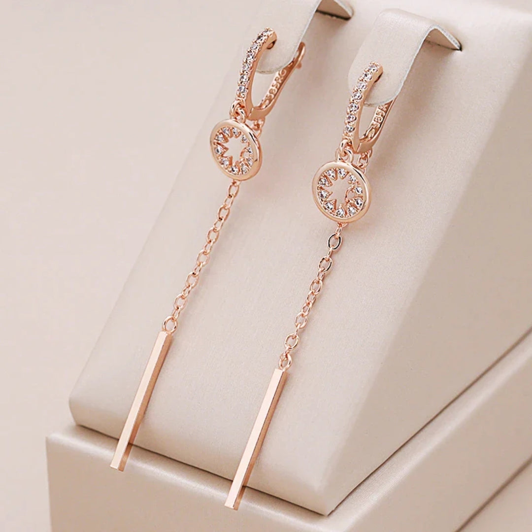 Glamouröse Roségold-Ohrhänger mit funkelnden Strasssteinen und Stab-Design