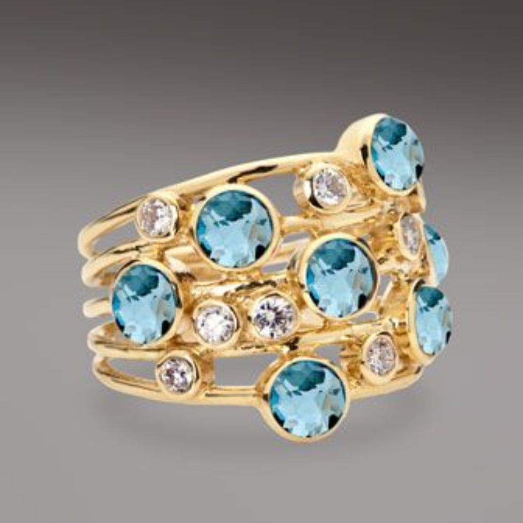 Vintage-Goldring mit zahlreichen blauen und weißen Zirkonen