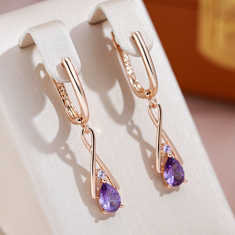 Elegante Ohrringe mit violetten Zirkonia-Tropfen und Roségold-Finish