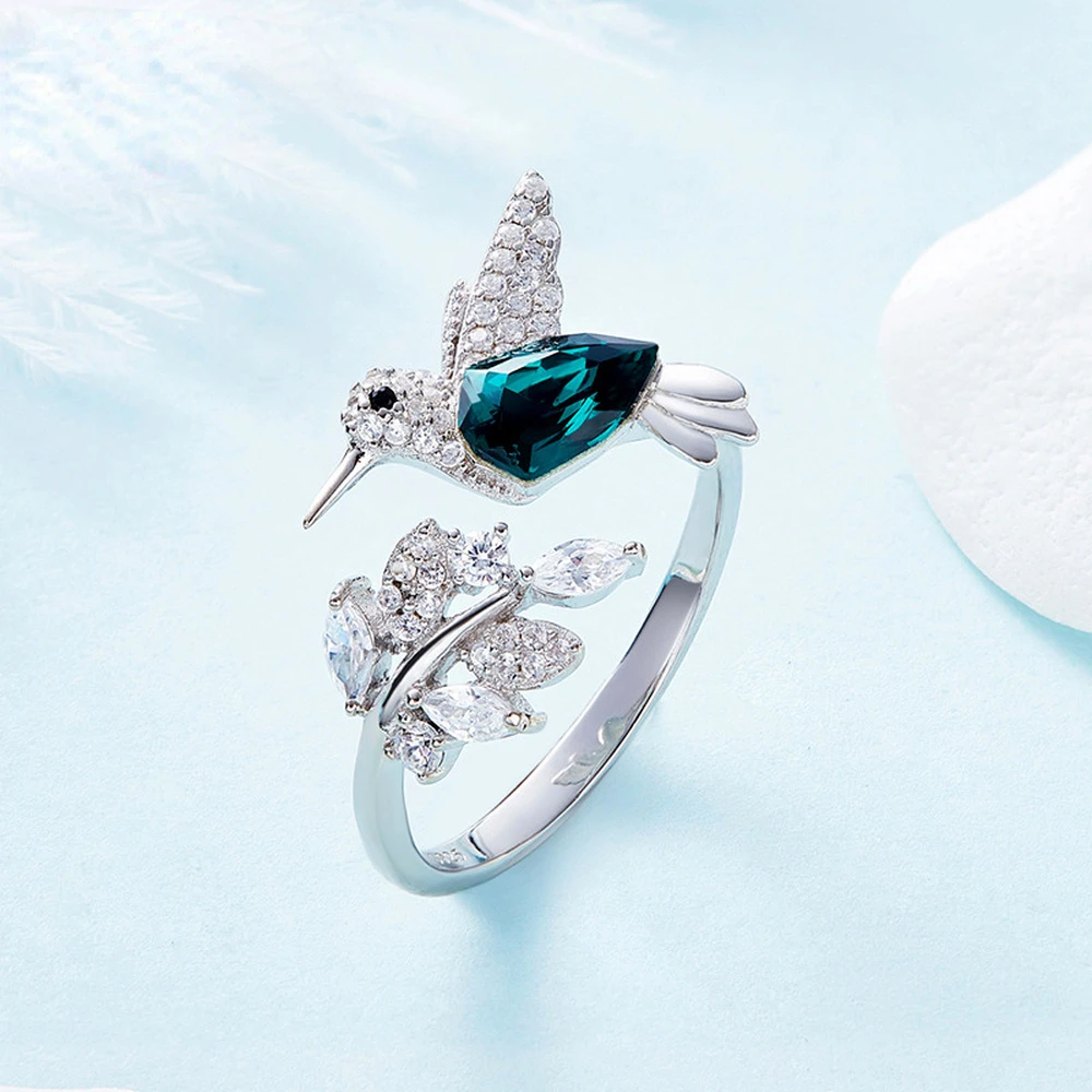 Verstellbarer Ring mit Vögeln und blauem Zirkon