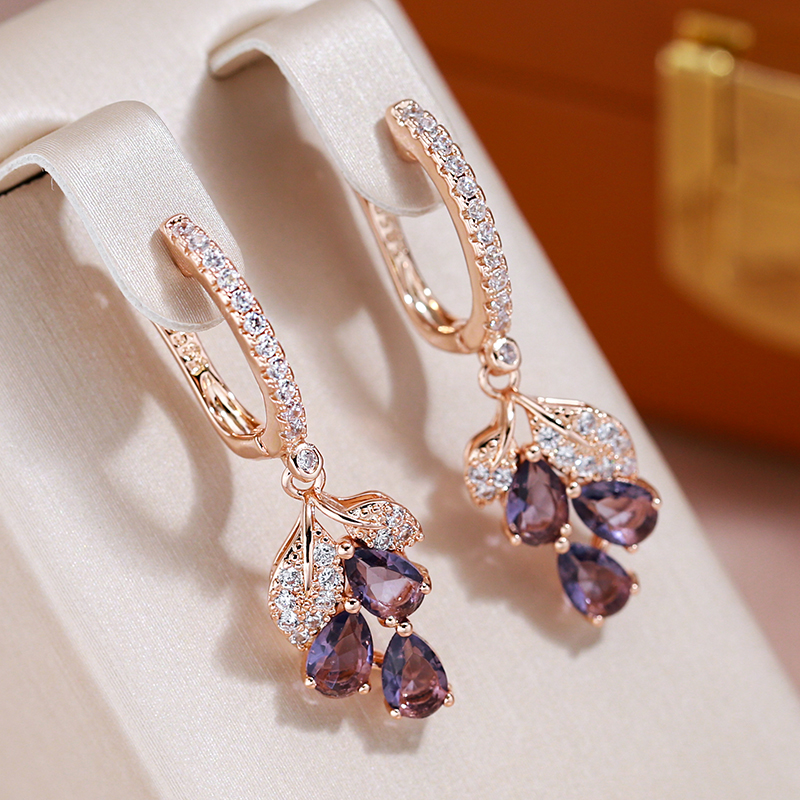 Elegante Roségoldfarbene Ohrringe mit Amethyst-Kristallen und glitzernden Zirkonia