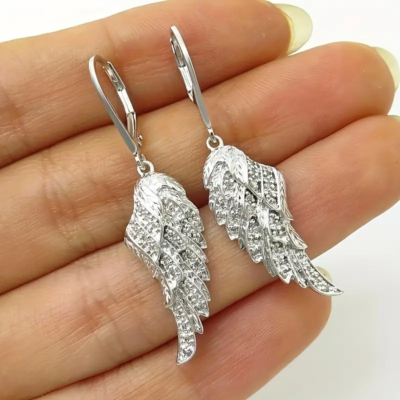 Funkelnde Engelflügel-Ohrringe mit glitzernden Zirkonia Steinen