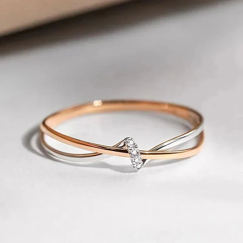 Eleganter Damen Ring aus Roségold und Silber mit Diamanten