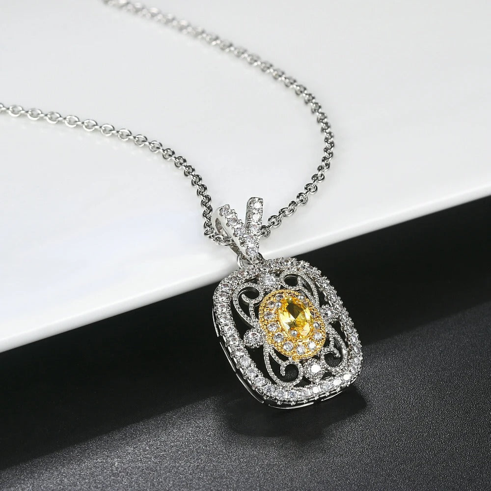 Eleganter Anhänger mit gelbem Edelstein und funkelnden Zirkonia Kristallen