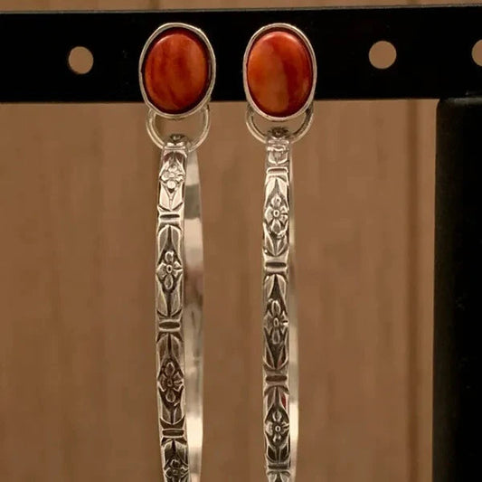 Elegante Ohrringe mit austauschbaren Edelsteinen und floralem Design
