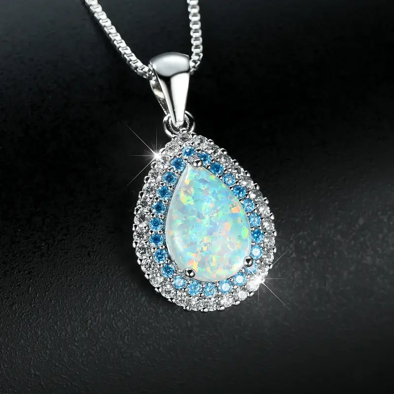 Glänzende Opal-Tropfen-Halskette mit blauen und weißen Zirkonia