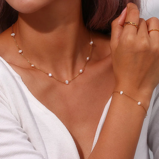 Elegantes Perlen Collier und Armband Set aus Edelstahl