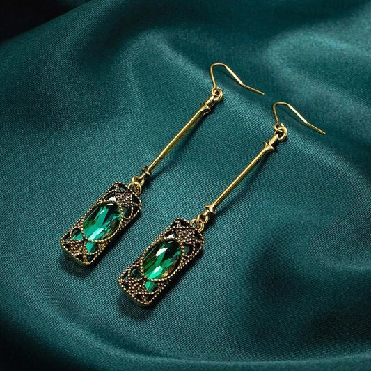 Elegante Vintage-Tropfenohrringe mit leuchtenden smaragdgrünen Edelsteinen