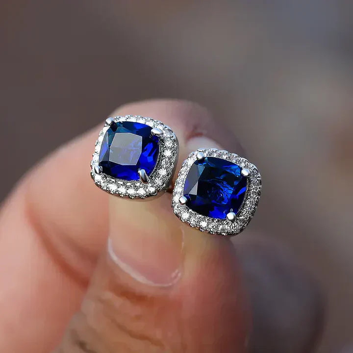 Elegante Saphir-Ohrstecker mit Zirkonia-Halo im Kissenschliff
