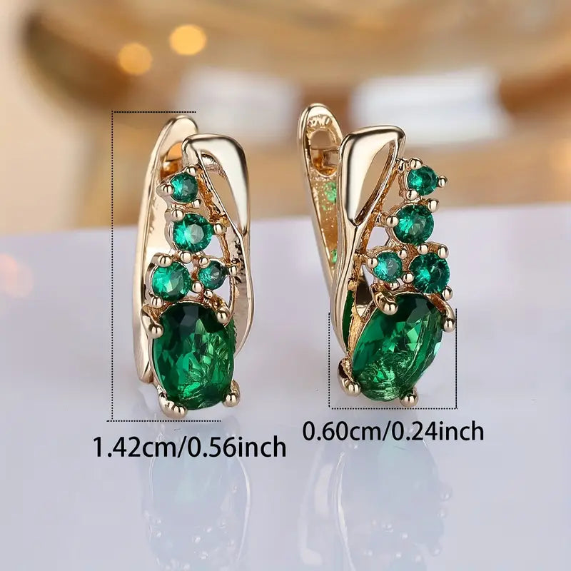 Elegante Ohrringe mit grünen Smaragd-ähnlichen Edelsteinen im Goldton