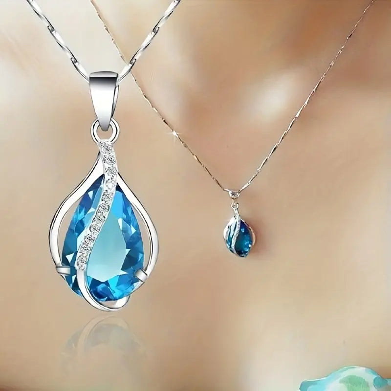 Edle Halskette mit blauem Aquamarin-Tropfen und Zirkonia-Akzenten