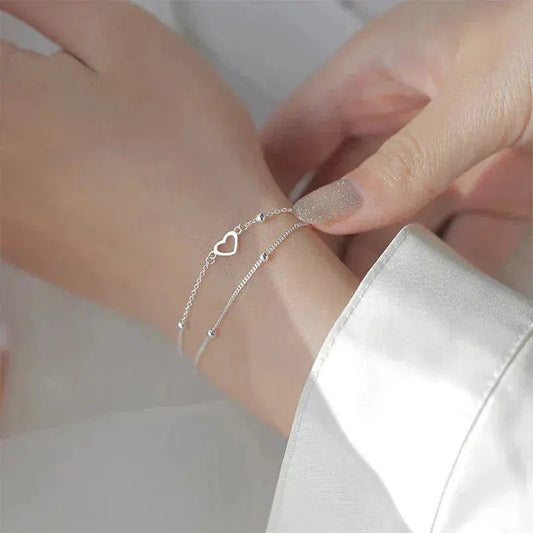 Elegantes Herz-Doppelketten-Armband mit feinen Kügelchen