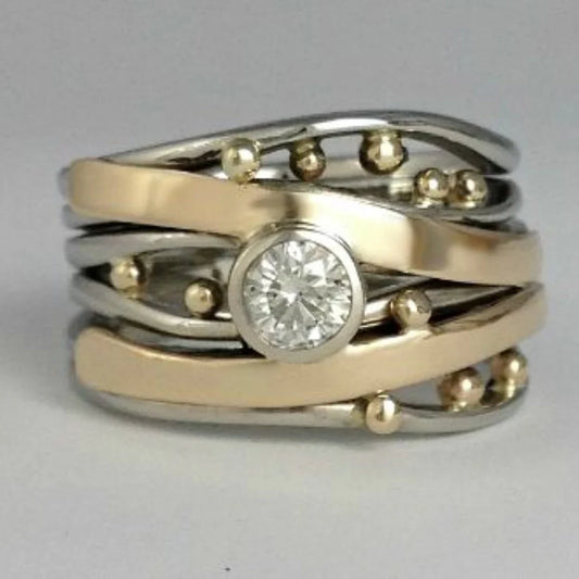 Vintage-Ring aus zweifarbigem Edelstahl mit Diamant in Rub-Over-Fassung