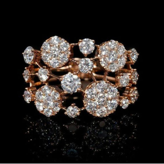 Vintage-Ring aus Roségold mit eingelegten glänzenden Steinen