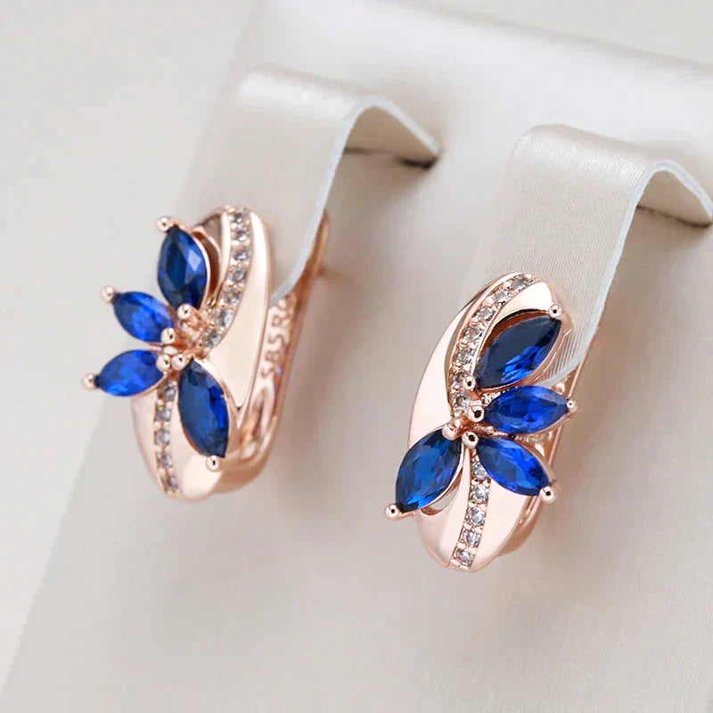 Roséfarbene Ohrringe mit blauen Marquise-Zirkonia und funkelnden Kristallen