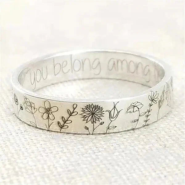 Edelstahlring mit Blumengravur und inspirierender Botschaft