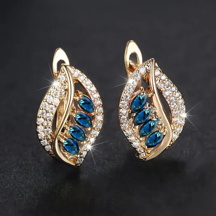 Elegante Ohrringe mit blauen Saphiren und funkelnden Zirkonia