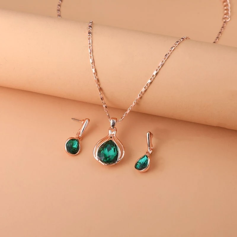 Elegantes Zwiebel-Design Halsketten- und Ohrring-Set mit grünem Kristall