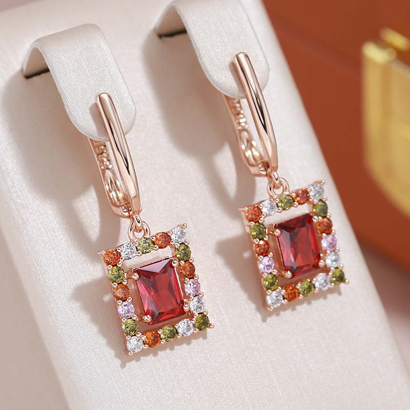 Elegante Roségold Ohrringe mit funkelnden Kristallen und leuchtenden Edelsteinen
