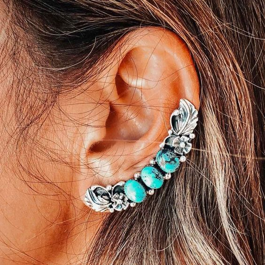 Blätter-Design Ohrklemme mit türkisblauen Steinen und floralen Details