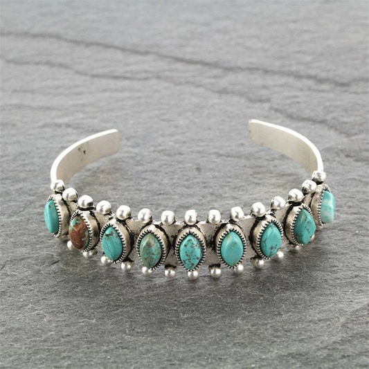 Vintage Türkis-Armband mit einzigartigen Details und antikem Flair