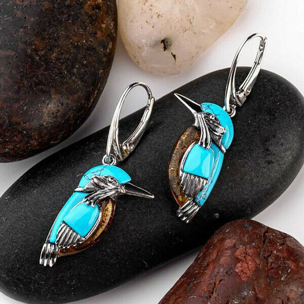 Türkisblaue Vogel Ohrringe mit Tier-Motiv und elegantem Design