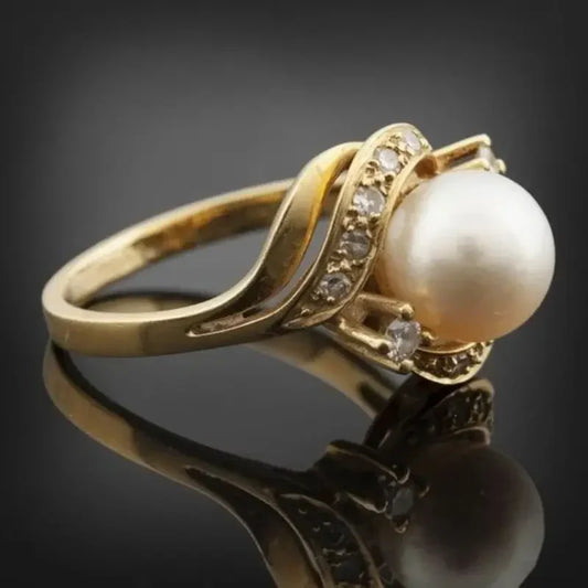Vintage-Ring mit einer goldenen Perle in der Mitte