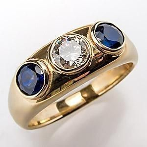 Ring mit Zirkonia und blauem Kristall