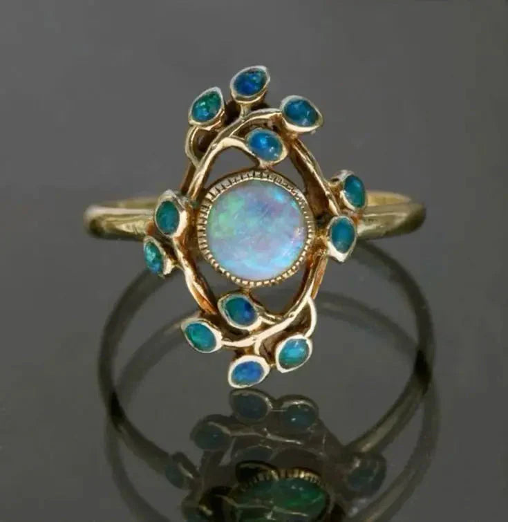 Vintage-Blumenring mit Opal Pal und türkisfarbenen Steinen