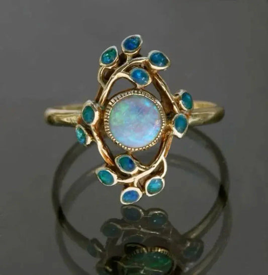 Vintage-Blumenring mit Opal Pal und türkisfarbenen Steinen