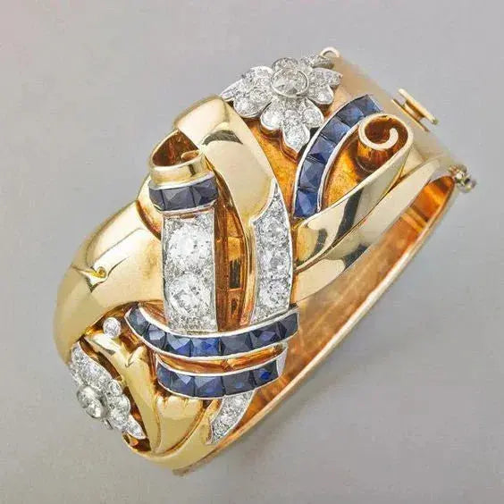 Eleganter Goldring mit Saphir und Diamanten im Vintage-Stil