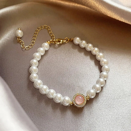 Elegantes Perlenarmband mit rosafarbenem Stein-Akzent und Verlängerungskette