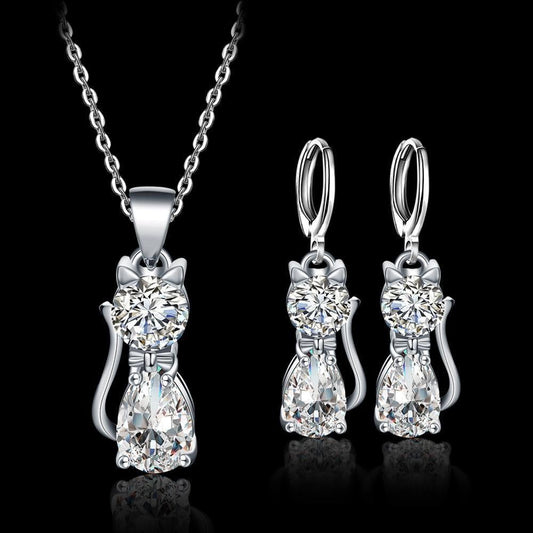 Glänzendes Katzen Schmuckset mit Zirkonia Halskette und Ohrringen